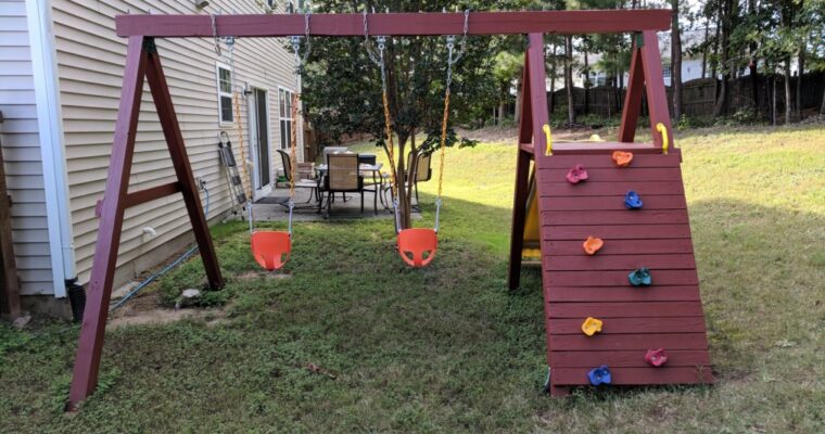 Economical Playset with Sturdy Swing Set, Climbing Wall, and Slide