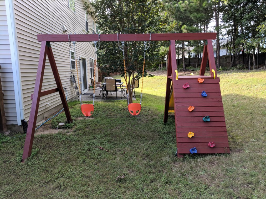 Economical Playset with Sturdy Swing Set, Climbing Wall, and Slide