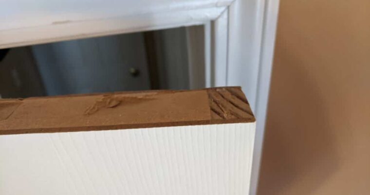 How to fix a door sticking at the top of the frame
