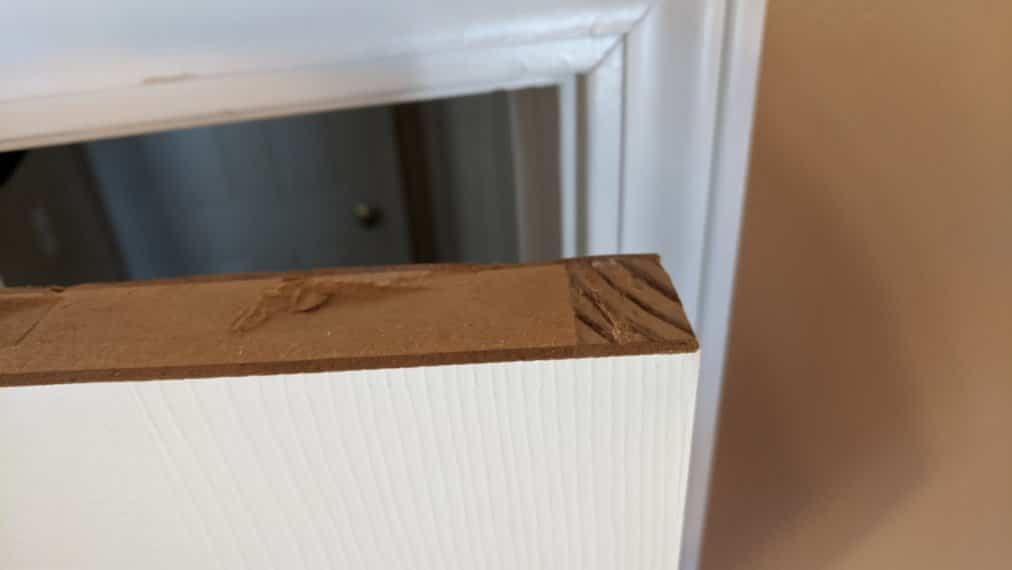 How to fix a door sticking at the top of the frame